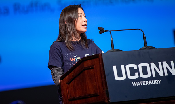 Dr. Fumiko Hoeft speaks to attendees from behind a podium